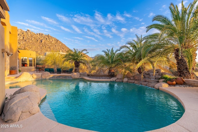 view of pool featuring a patio area and a fenced in pool