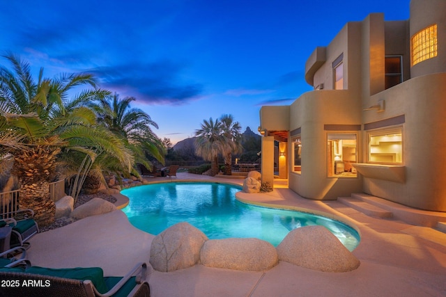 pool with a patio