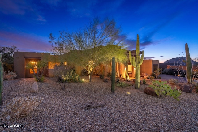 exterior space with stucco siding