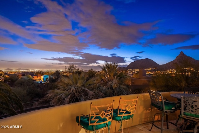 view of patio / terrace featuring a mountain view