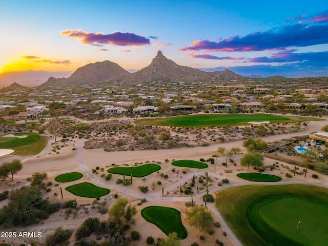 drone / aerial view featuring a mountain view and view of golf course