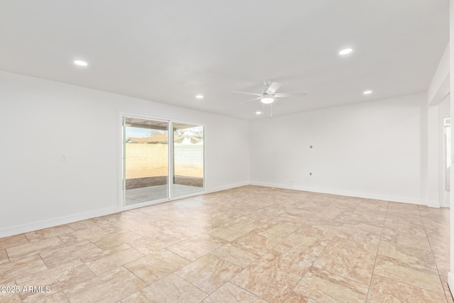 empty room featuring ceiling fan