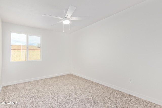 unfurnished room with carpet and ceiling fan