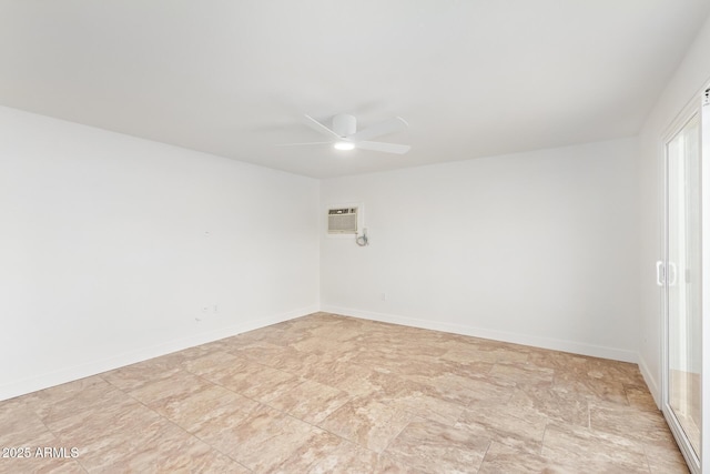 spare room with a wall mounted air conditioner and ceiling fan