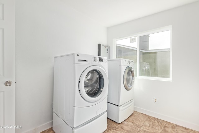 laundry area featuring independent washer and dryer