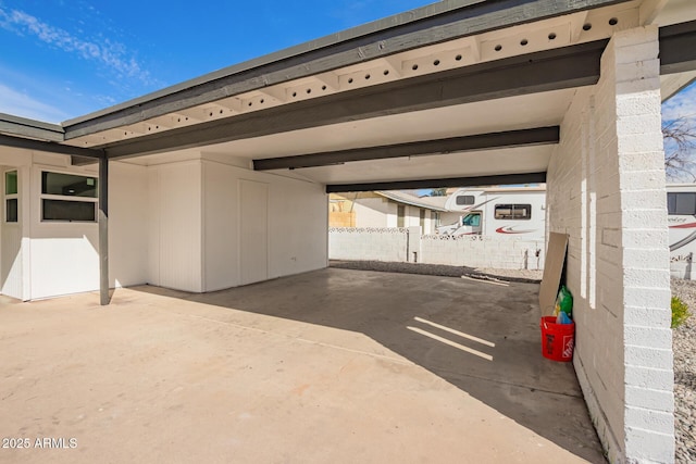 exterior space with a carport