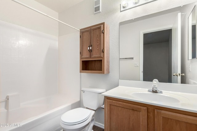 full bathroom featuring visible vents, toilet, shower / washtub combination, and vanity