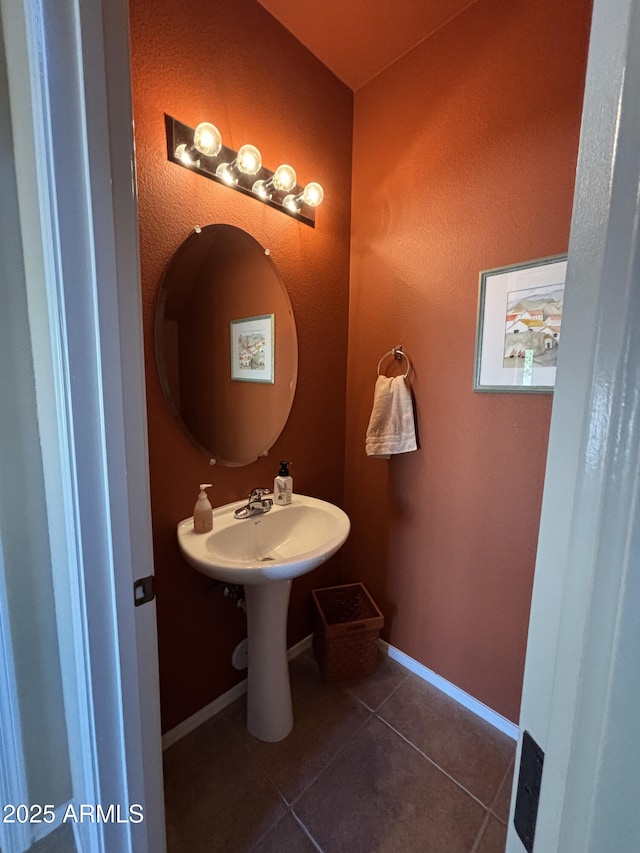 bathroom with tile patterned flooring