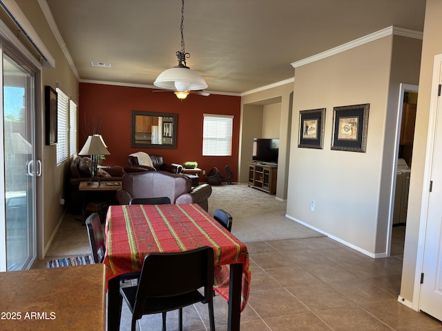 tiled dining area with ornamental molding