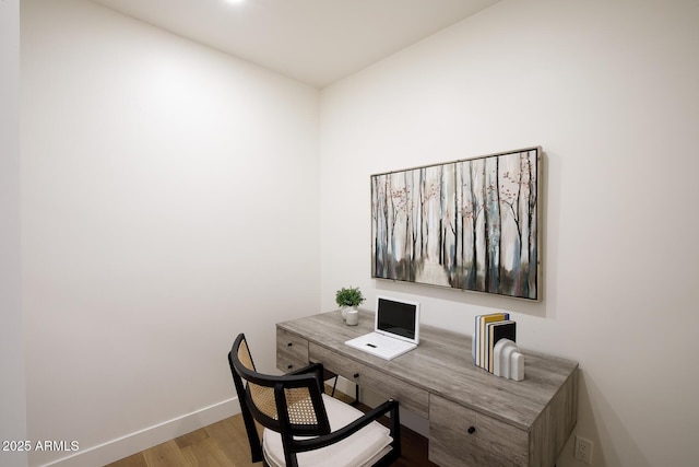 7348 N 9th Pl, Phoenix, AZ 85020 - home office with wood finished floors and baseboards