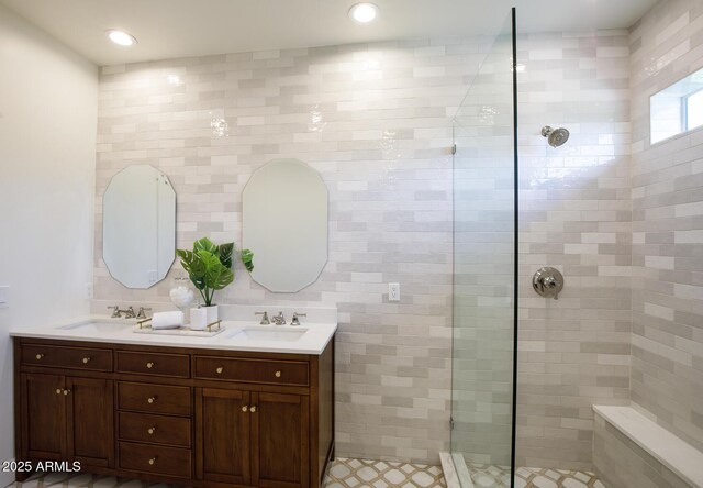 7348 N 9th Pl, Phoenix, AZ 85020 - bathroom featuring a walk in shower, double vanity, and recessed lighting