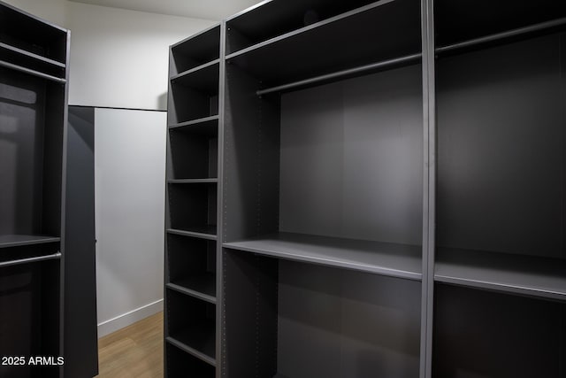 7348 N 9th Pl, Phoenix, AZ 85020 - walk in closet featuring light wood-style flooring