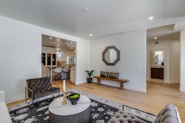 7348 N 9th Pl, Phoenix, AZ 85020 - living room with light wood-style flooring, recessed lighting, and baseboards