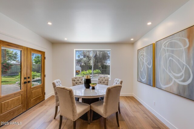 7348 N 9th Pl, Phoenix, AZ 85020 - dining space featuring french doors, light wood-style flooring, recessed lighting, and baseboards
