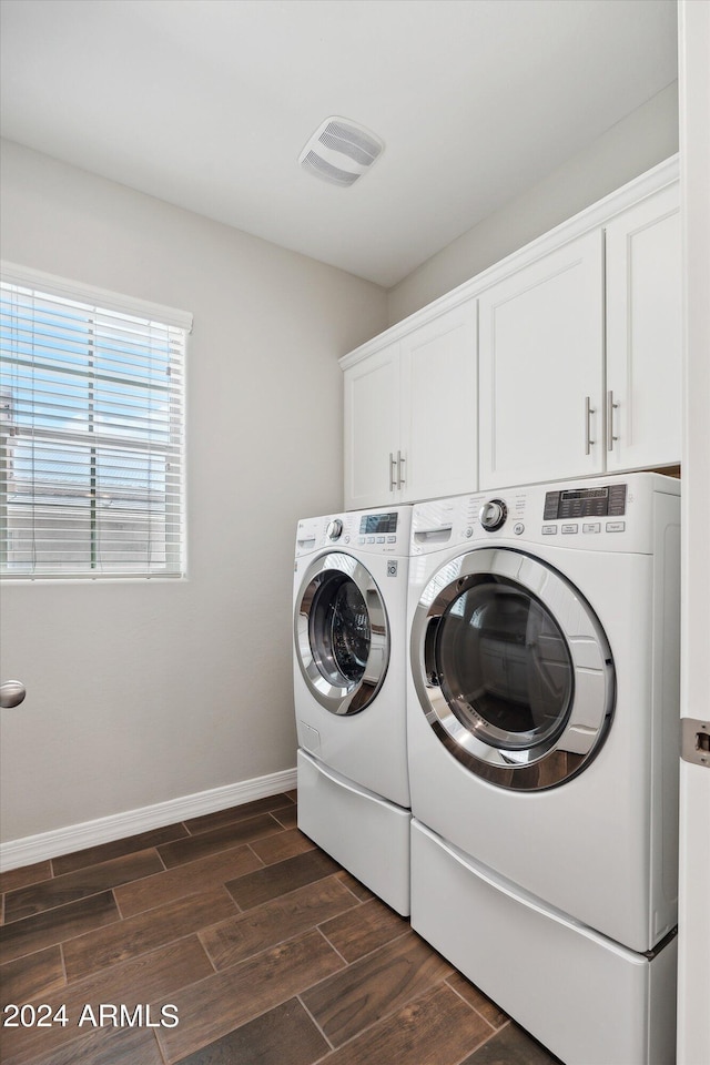 10630 W Pinchot Ave, Avondale, AZ 85392 - laundry room featuring washer and clothes dryer and cabinets
