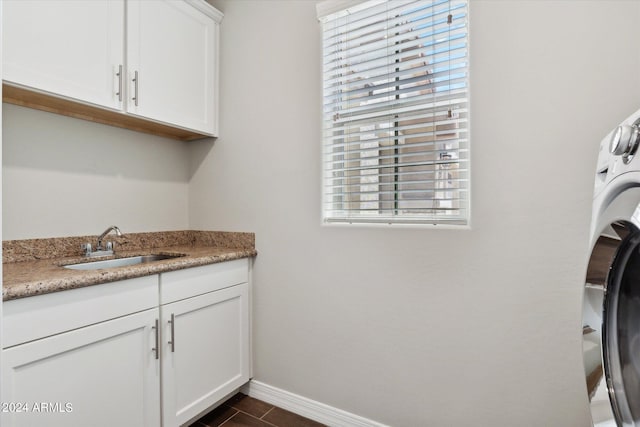 10630 W Pinchot Ave, Avondale, AZ 85392 - laundry room with cabinets, washer / clothes dryer, and sink
