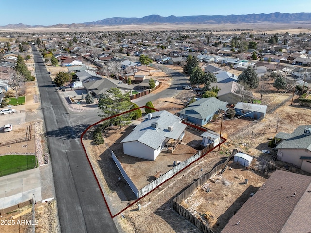 aerial view featuring a residential view and a mountain view