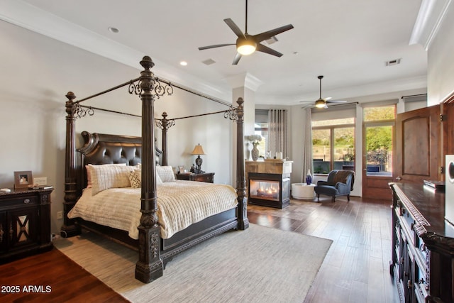 bedroom with recessed lighting, wood finished floors, visible vents, and ceiling fan