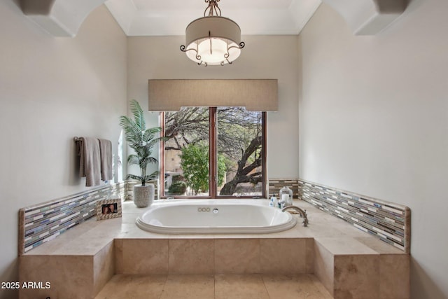 bathroom with a garden tub