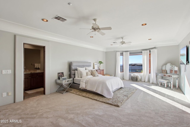 bedroom featuring visible vents, recessed lighting, connected bathroom, carpet flooring, and crown molding