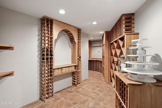 wine room with recessed lighting