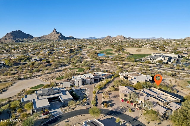 birds eye view of property with a mountain view and a residential view