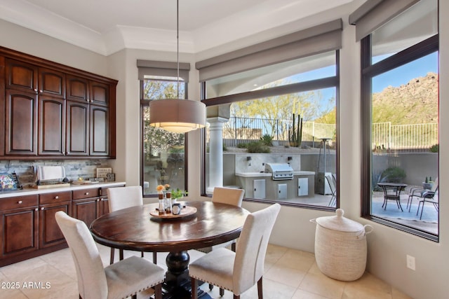 dining space with light tile patterned floors