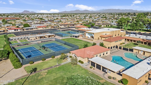 birds eye view of property featuring a mountain view