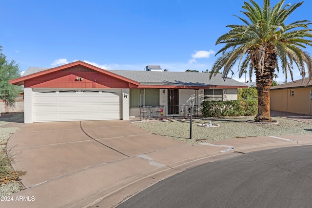 single story home with a garage