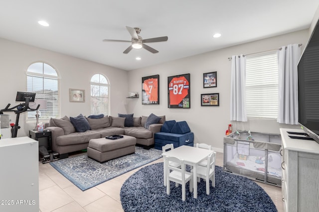 living room featuring ceiling fan