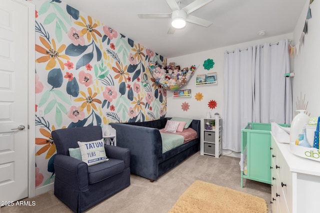 bedroom with light carpet and ceiling fan