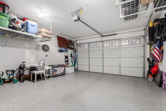 garage featuring a garage door opener