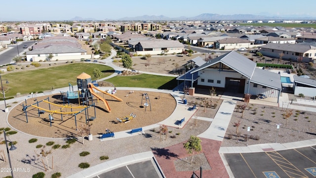 birds eye view of property with a mountain view