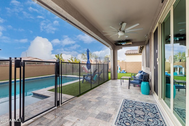 balcony featuring a patio and ceiling fan