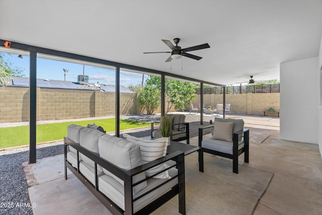 8732 E Arlington Rd, Scottsdale, AZ 85250 - fenced backyard with outdoor lounge area, ceiling fan, and a patio area