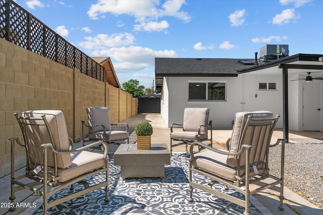 8732 E Arlington Rd, Scottsdale, AZ 85250 - fenced backyard featuring cooling unit, a patio area, and an outdoor hangout area