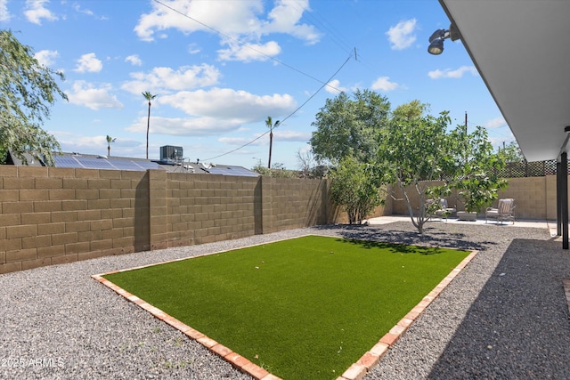 8732 E Arlington Rd, Scottsdale, AZ 85250 - fenced backyard featuring cooling unit and a patio