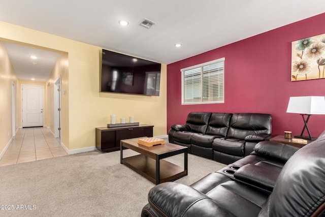 23407 W Winslow Ave, Buckeye, AZ 85326 - tiled living room featuring recessed lighting, carpet flooring, baseboards, and an accent wall