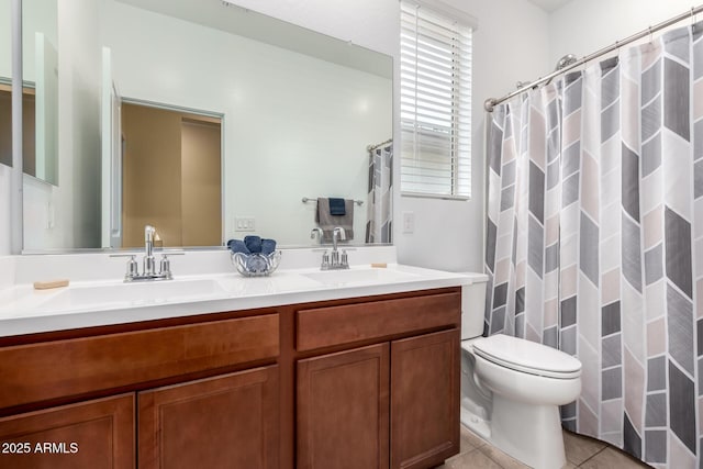 23407 W Winslow Ave, Buckeye, AZ 85326 - bathroom with toilet, tile patterned floors, double vanity, and a shower with shower curtain