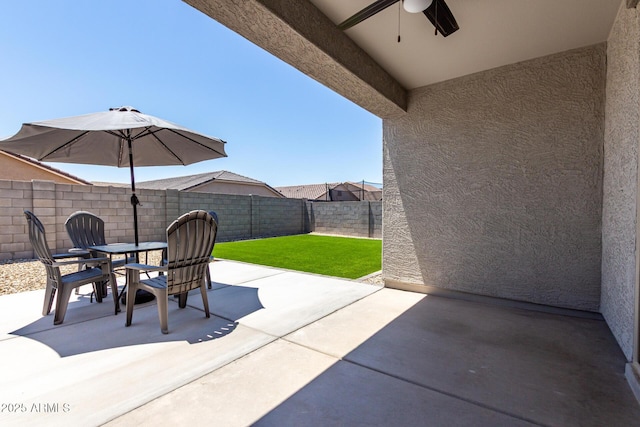 23407 W Winslow Ave, Buckeye, AZ 85326 - view of patio / terrace with ceiling fan and outdoor dining space