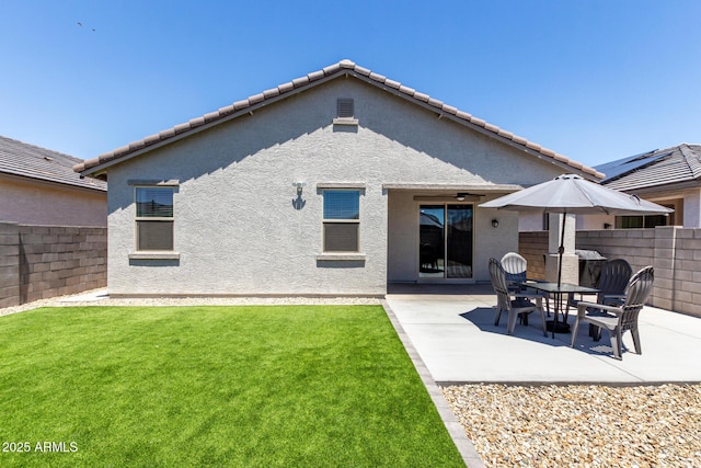 23407 W Winslow Ave, Buckeye, AZ 85326 - back of house with a patio area and stucco siding