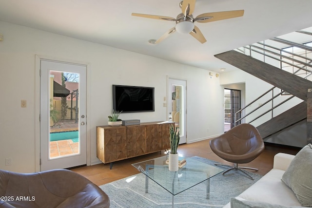 living room featuring ceiling fan