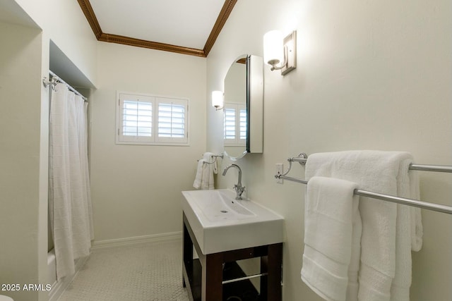 bathroom with shower / bathtub combination with curtain and crown molding