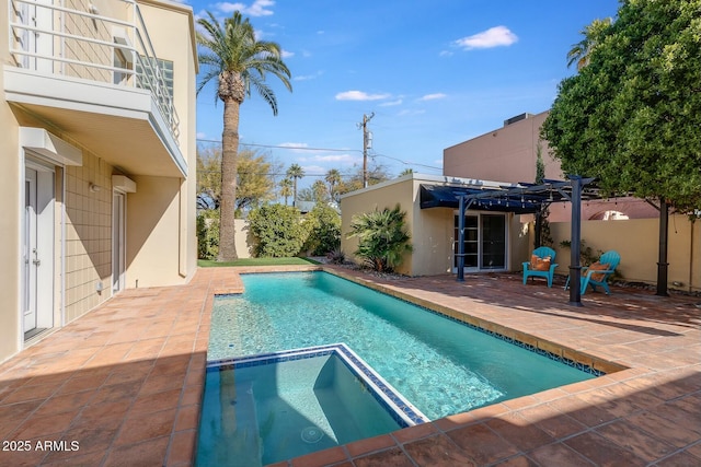 view of swimming pool with a pergola and a patio area