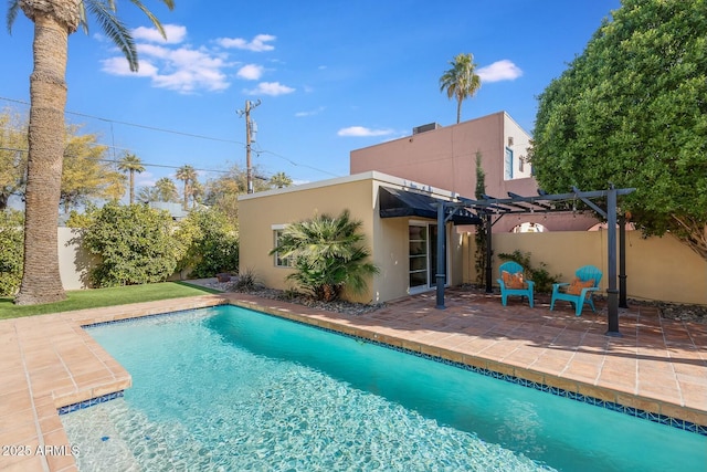 view of swimming pool featuring a patio and a pergola