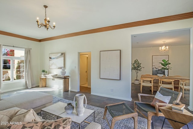 living room featuring ornamental molding and a notable chandelier