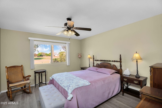 811 S 79th Way, Mesa, AZ 85208 - bedroom with wood finished floors, baseboards, and a ceiling fan