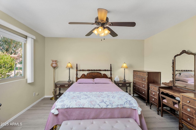 811 S 79th Way, Mesa, AZ 85208 - bedroom with wood finished floors, baseboards, and ceiling fan