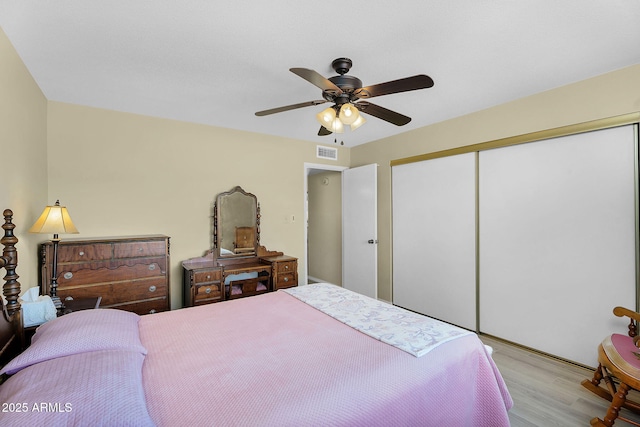 811 S 79th Way, Mesa, AZ 85208 - bedroom featuring a closet, wood finished floors, and ceiling fan
