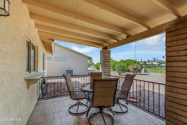 811 S 79th Way, Mesa, AZ 85208 - view of patio / terrace featuring outdoor dining space and central AC unit